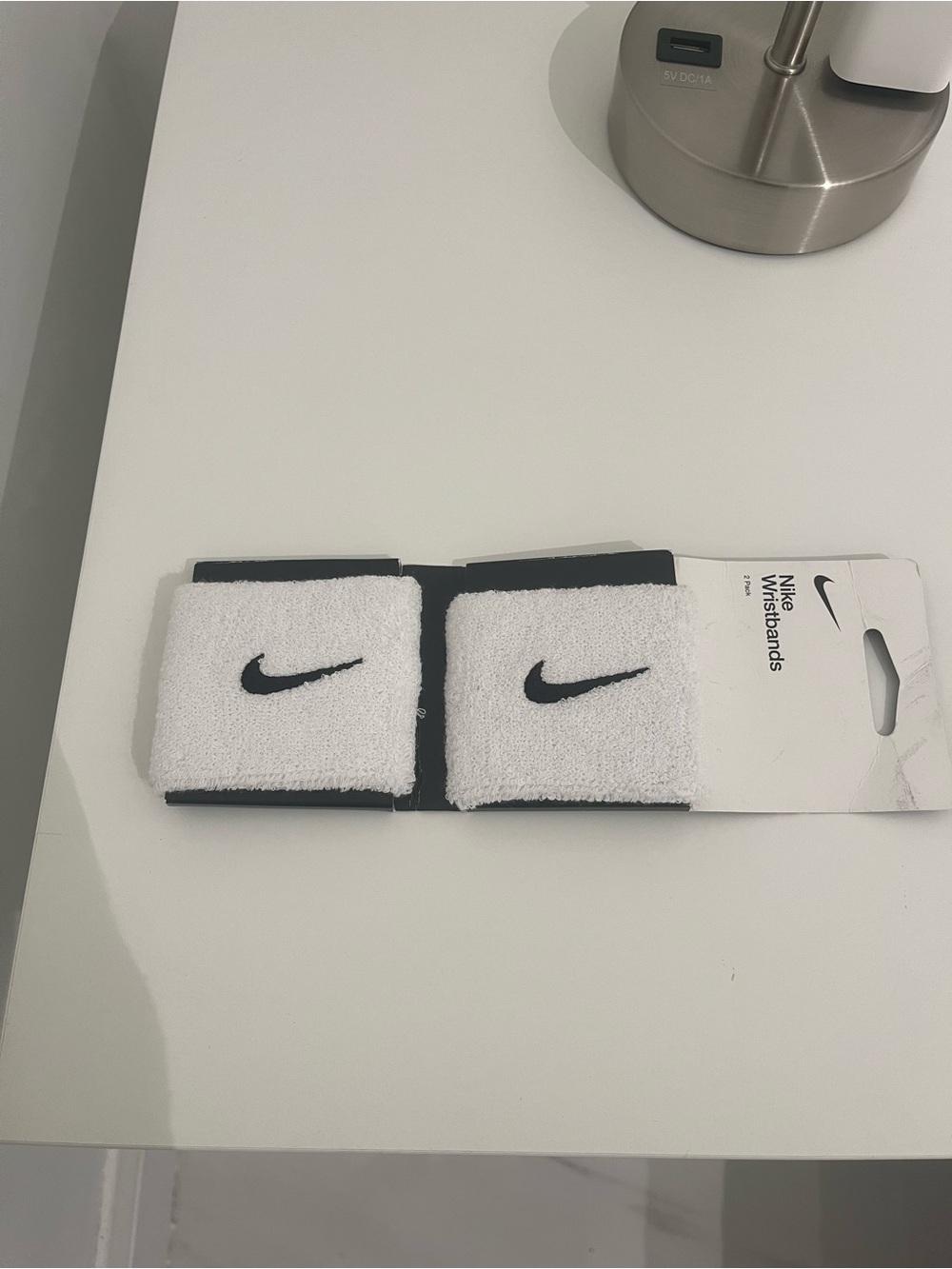 Nike White Wristbands with Black Swoosh Logo Pair